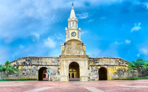 View of building against cloudy sky