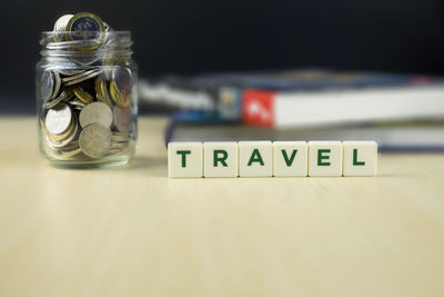 Close-up of text in jar on table