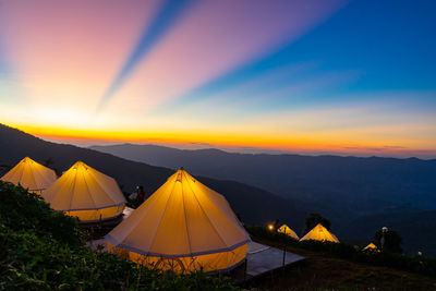 Scenic view of mountains against sky during sunset