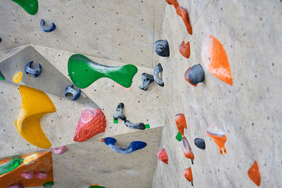 Bouldering gym with artificial colourful rock wall