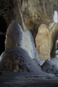 Close-up of rock formation on snow