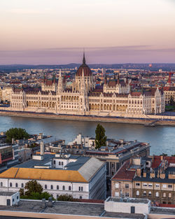 Beautiful panorama of the hungarian parliament building at the sunset from buda castle