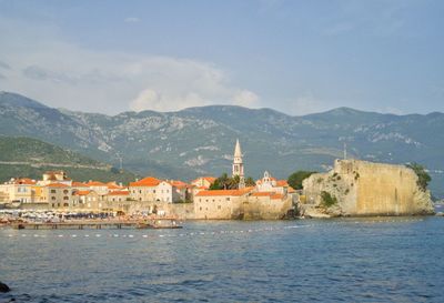 Town with mountain range in background