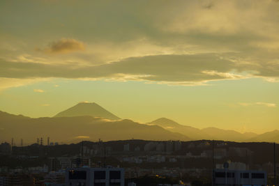 Scenic view of mountains against sky during sunset