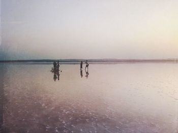 People on boat in sea