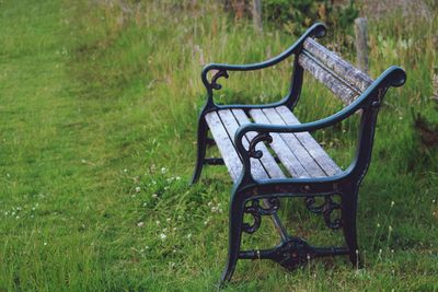 Empty bench in park