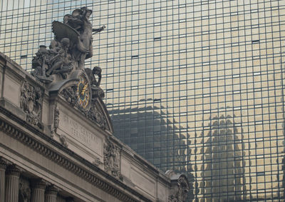 Low angle view of statues on grand central station