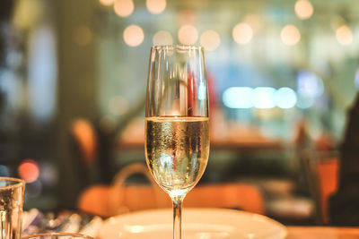 Close-up of wine glass on table