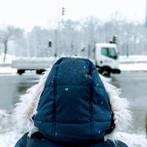 Rear view of person in snow