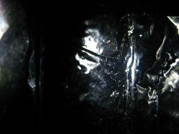 Close-up of water drops on glass