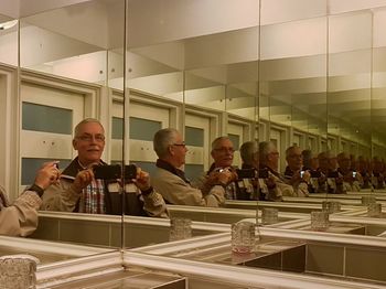 Men standing in corridor