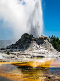 Geyser spraying at yellowstone national park