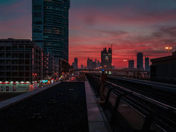 View of skyscrapers at sunset