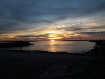 Scenic view of sea against sky during sunset