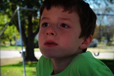 Close-up of boy looking away