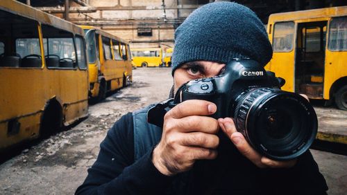 Portrait of man photographing