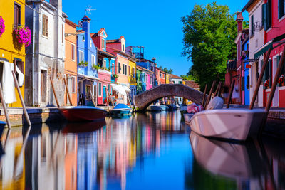 A long exposure shot of burano with colorful house and reflection