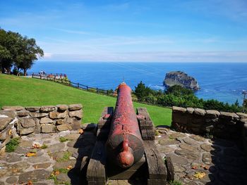 High angle view of cannon against sea