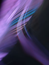 Close-up of light trails against black background