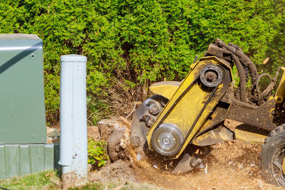 Abandoned vintage car on field