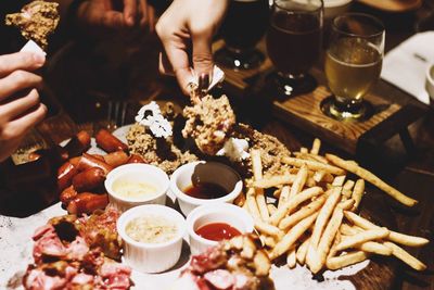 People having meat in restaurant