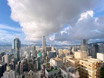 Panoramic view of buildings in city against sky