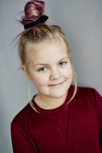 Portrait of smiling girl looking at camera