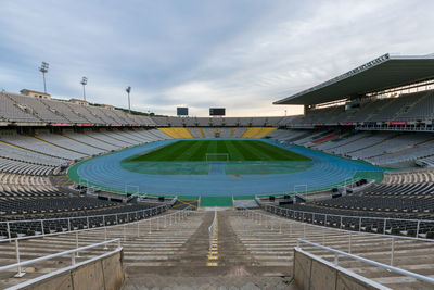 Olimpic stadium lluís companys under a cloudy sky