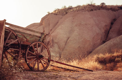 View of abandoned car on land