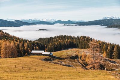 Scenic view of snowcapped mountains against sky