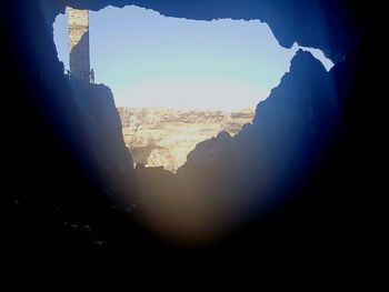 Scenic view of silhouette mountains against sky