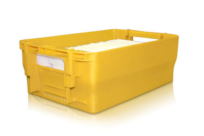 Close-up of yellow box over white background