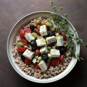 Directly above shot of chopped fruits in bowl on table