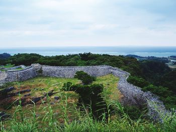 Scenic view of calm sea against sky