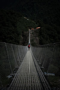 Bridge against mountains