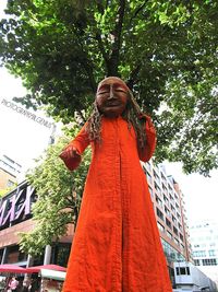 Low angle view of statue against building