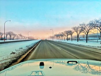 Road against sky during winter