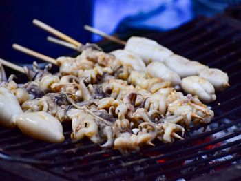 Close-up of meat on barbecue grill