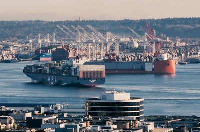 Commercial dock and sea against sky