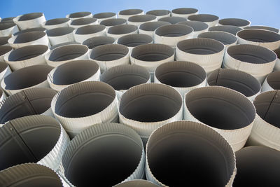 Downpipe warehouse. steel pipes, parts for the construction of a roof drainage system in a warehouse