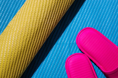 High angle view of slippers on mat