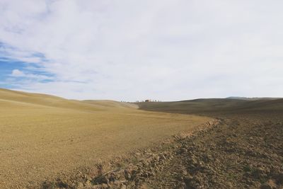 Scenic view of land against sky