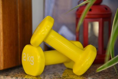 Close-up of yellow toy on table