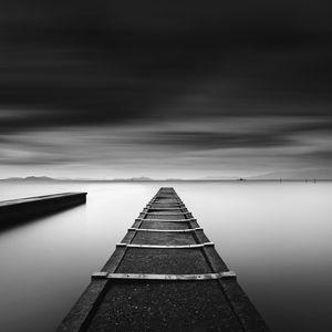 Long exposure shot of jetty and dramatic clouds, lake biwa, shiga prefecture, japan