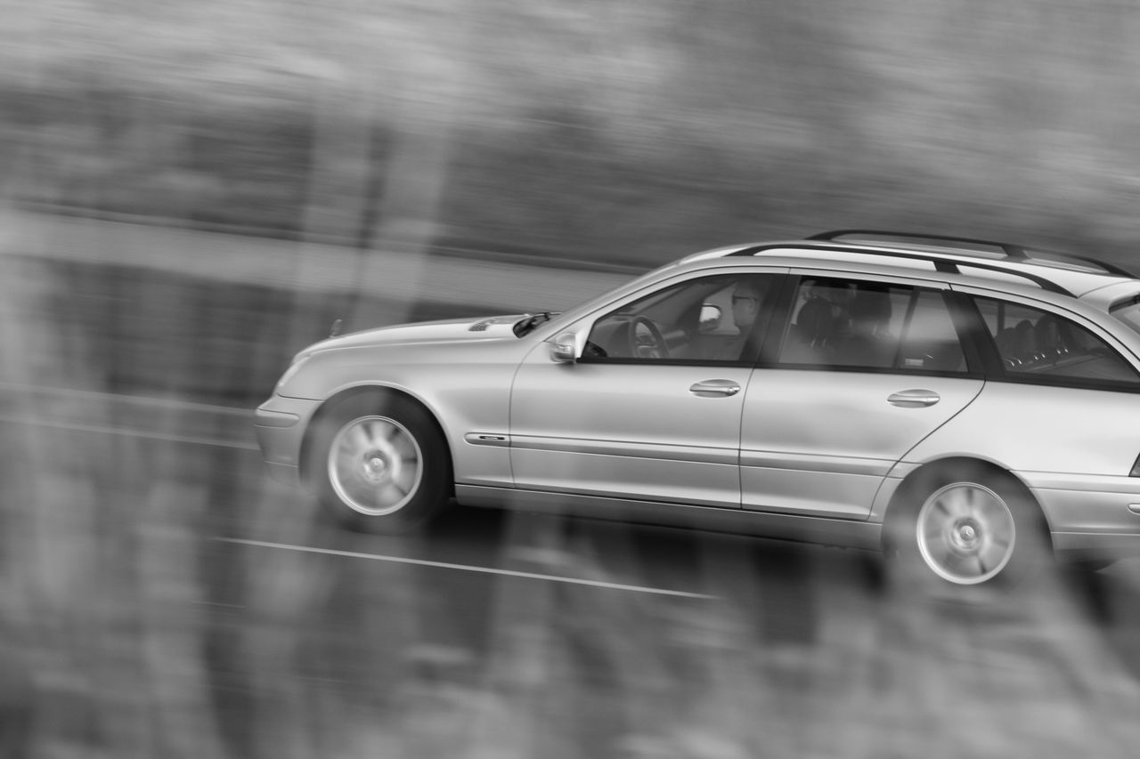 VIEW OF CAR ON ROAD