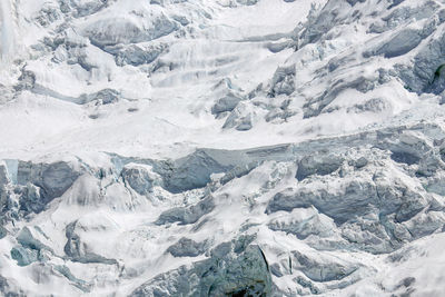 Scenic view of snow covered mountains