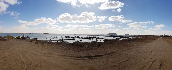 Panoramic view of beach against sky