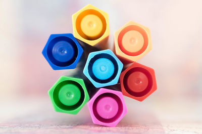Close-up of multi colored felt tip pens on white background