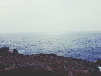Scenic view of sea against clear sky