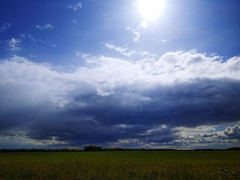 Scenic view of field against sky